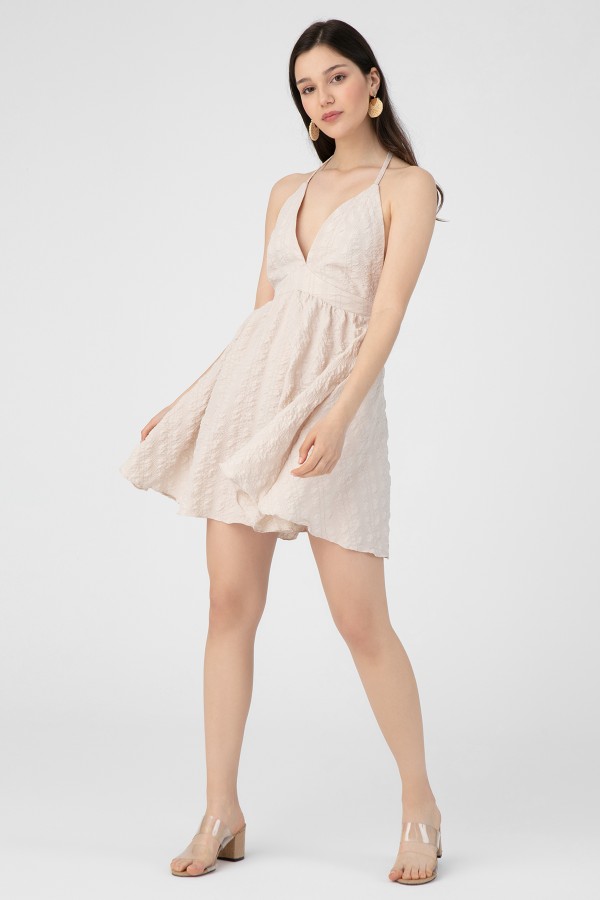 Elfenbeinfarbenes Neckholder-Kleid mit Rückenausschnitt - 1