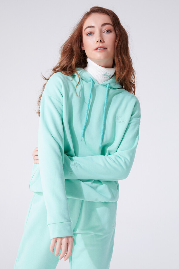 Mintgrünes Kapuzen-Sweatshirt mit weitem Schnitt - 1
