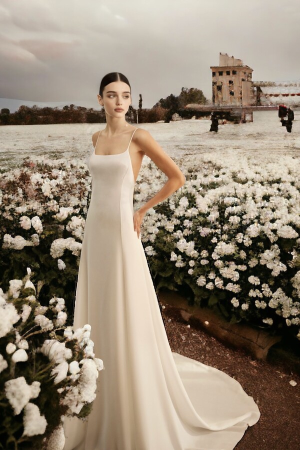 Off-white wedding dress with thin straps and open back - 1