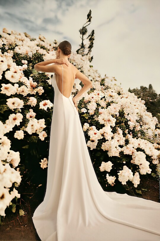 Off-white wedding dress with thin straps and open back - 2