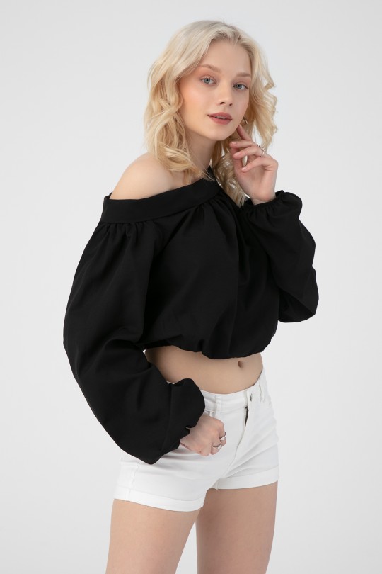 Schwarze Bluse mit überschnittenen Schultern und elastischem Bund 