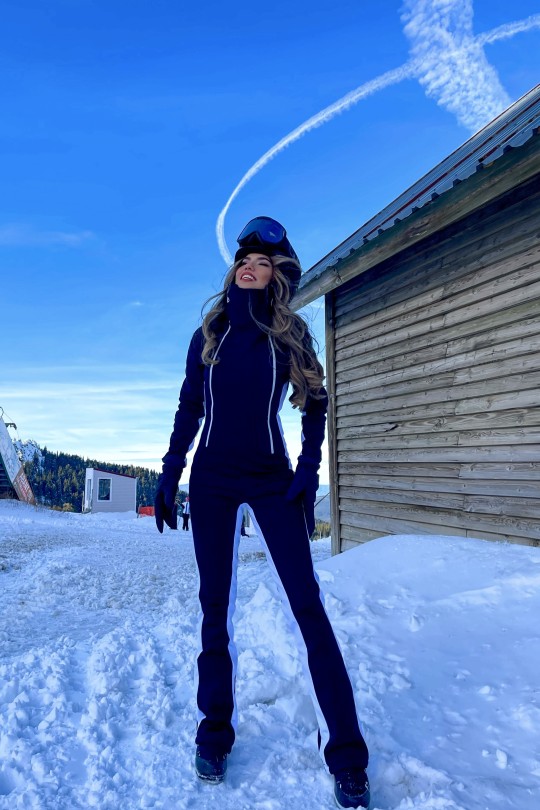 Schwarzer Skioverall mit weitem Bein und doppeltem Reißverschluss und Streifen - 1