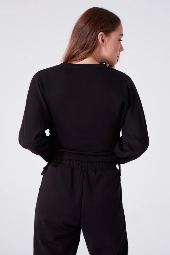 Schwarzes Sweatshirt mit Rundhalsausschnitt, langen Ärmeln und seitlicher Schleife - 3